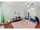 Bright and inviting living room features hardwood floors, modern decor and lots of space at 170 Danzid Dr, Summerville, SC 29483