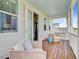 Charming balcony with wicker furniture, a blue ceiling, and access to interior at 176 Midtown Ave, Summerville, SC 29486