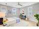 This bedroom offers a ceiling fan, wood floors, and a cabinet for extra storage at 176 Midtown Ave, Summerville, SC 29486