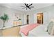 Bedroom featuring a ceiling fan, a cozy seating area and connecting doors to other rooms at 176 Midtown Ave, Summerville, SC 29486