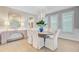 Bright dining room featuring white seating, stylish lighting, and trendy decor at 176 Midtown Ave, Summerville, SC 29486