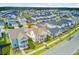 Charming homes with manicured lawns and inviting front porches line a peaceful street in a planned community at 176 Midtown Ave, Summerville, SC 29486