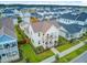 A beautiful two-story home features a welcoming porch, neat landscaping, and inviting curb appeal at 176 Midtown Ave, Summerville, SC 29486