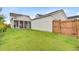 Garage and fence and lawn in the backyard of 176 Midtown Ave, Summerville, SC 29486 at 176 Midtown Ave, Summerville, SC 29486