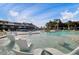 Relaxing community pool with in-water lounge chairs and nearby pavilion at 176 Midtown Ave, Summerville, SC 29486