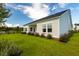Beautiful backyard featuring lush green lawn and tidy landscaping, enhancing the home's curb appeal at 177 Threaded Fern St, Summerville, SC 29485