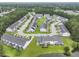 Well-maintained townhomes with lush lawns in a friendly neighborhood near a scenic pond at 192 Buchanan Cir, Goose Creek, SC 29445