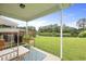 Back porch with seating overlooking a peaceful lake and lush greenery at 192 Buchanan Cir, Goose Creek, SC 29445