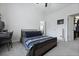 Neutral bedroom with a view to the ensuite bathroom and closet at 192 Buchanan Cir, Goose Creek, SC 29445