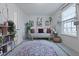 Bright bonus room showcasing natural light, daybed, and plants at 192 Buchanan Cir, Goose Creek, SC 29445