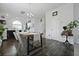 Inviting dining room with hardwood floors, modern chandelier, and views of the kitchen at 192 Buchanan Cir, Goose Creek, SC 29445