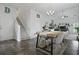 Open dining space with a staircase, hardwood floors, and plenty of natural light at 192 Buchanan Cir, Goose Creek, SC 29445