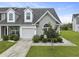 Charming home featuring a one car garage, lush landscaping, and inviting curb appeal at 192 Buchanan Cir, Goose Creek, SC 29445