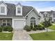 Charming home featuring a one car garage, lush landscaping, and inviting curb appeal at 192 Buchanan Cir, Goose Creek, SC 29445