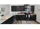 Well-equipped kitchen with dark cabinets, granite counters and modern appliances at 192 Buchanan Cir, Goose Creek, SC 29445