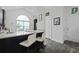 Stylish kitchen featuring granite countertops, a breakfast bar, and modern finishes at 192 Buchanan Cir, Goose Creek, SC 29445