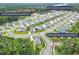Aerial view of neighborhood showcasing community layout, amenities, and street access at 1973 Parish House Cir, Johns Island, SC 29455