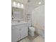 Well-lit bathroom with patterned shower curtain, a vanity, and modern fixtures, creating a spa-like experience at 1973 Parish House Cir, Johns Island, SC 29455