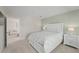 Well-lit bedroom features shiplap wall and a doorway to a sitting room at 1973 Parish House Cir, Johns Island, SC 29455