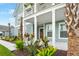 Front porch featuring decorative planters, creating an inviting entrance to this beautiful home at 1973 Parish House Cir, Johns Island, SC 29455