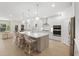 Spacious kitchen with a central island, modern appliances, and an open view to the living area at 1973 Parish House Cir, Johns Island, SC 29455