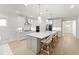 Bright and airy kitchen featuring a large center island and modern appliances at 1973 Parish House Cir, Johns Island, SC 29455