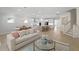 Open-concept living area connecting kitchen and dining, perfect for Gathering gatherings at 1973 Parish House Cir, Johns Island, SC 29455