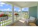 Inviting outdoor patio with wicker seating, flower boxes, and a view of the surrounding neighborhood at 1973 Parish House Cir, Johns Island, SC 29455
