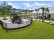 Community playground with climbing structures and slides, perfect for Gathering fun and activities at 1973 Parish House Cir, Johns Island, SC 29455