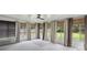 Bright sunroom featuring multiple windows offering views of the backyard at 1975 Fruitwood Ave, Charleston, SC 29414