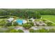 Aerial view of the community pool, playground, and green space at 201 Old Market Ct, Moncks Corner, SC 29461