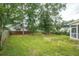 Spacious backyard with mature trees and a wood fence at 201 Old Market Ct, Moncks Corner, SC 29461