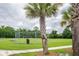 Lush green community field with soccer goal and palm trees at 201 Old Market Ct, Moncks Corner, SC 29461