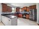 Kitchen featuring dark wood cabinets, stainless steel appliances, and a granite counter top at 201 Old Market Ct, Moncks Corner, SC 29461