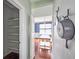 Walk-in pantry with open shelving, hardwood floors, and decorative hooks at 201 Old Market Ct, Moncks Corner, SC 29461
