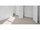 Neutral bedroom with carpet flooring, white walls, closet, and natural light at 2032 Sea Water Dr, Charleston, SC 29412