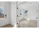 Bright office space with natural light, neutral paint and vinyl flooring with french doors at 2032 Sea Water Dr, Charleston, SC 29412