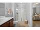 Bathroom featuring tiled floors, shower, and a wood vanity at 2064 Promenade Ct, Mount Pleasant, SC 29466