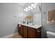 Bathroom featuring a wood vanity, modern lighting and mirror at 2064 Promenade Ct, Mount Pleasant, SC 29466
