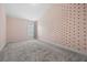 Bedroom featuring a sloped wall with polka dot accents and carpet flooring at 2064 Promenade Ct, Mount Pleasant, SC 29466