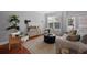Bright living room with a plush rug and neutral decor at 2064 Promenade Ct, Mount Pleasant, SC 29466