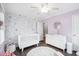 Bedroom includes a crib, dresser and decorations at 2158 Till Rd, Charleston, SC 29414