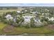 Overhead neighborhood view highlighting its serene pond, marsh, waterways and landscaping at 228 Beresford Creek St, Charleston, SC 29492
