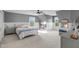Bright bedroom featuring carpet floors, white trim, and light gray walls at 228 Beresford Creek St, Charleston, SC 29492