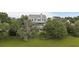 Charming two-story home with inviting porch and beautiful landscaping and view of grassy marshland at 228 Beresford Creek St, Charleston, SC 29492