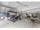 Spacious garage featuring a golf cart, bicycles, and ample storage space with 3 garage doors at 228 Beresford Creek St, Charleston, SC 29492