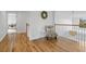 Upstairs landing features chair and view at 228 Beresford Creek St, Charleston, SC 29492