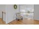 Upstairs landing showcases chair and view at 228 Beresford Creek St, Charleston, SC 29492