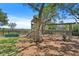 Playground with slide and swings and a climbing wall, surrounded by beautiful trees and overlooks scenic marsh views at 2369 Rice Pond Rd, Charleston, SC 29414