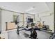 Finished basement features a home gym area with weightlifting equipment, providing a dedicated workout space at 2369 Rice Pond Rd, Charleston, SC 29414